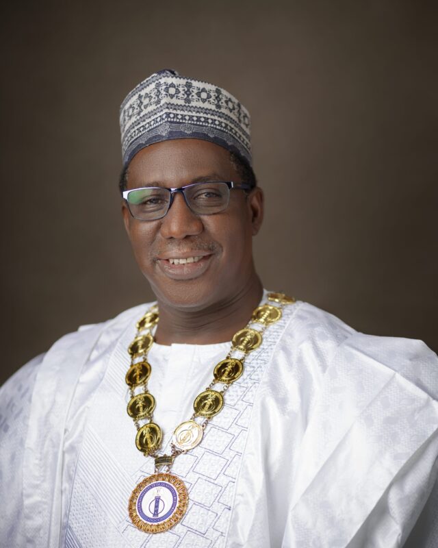 NIQS President delivering opening remark at his business dinner